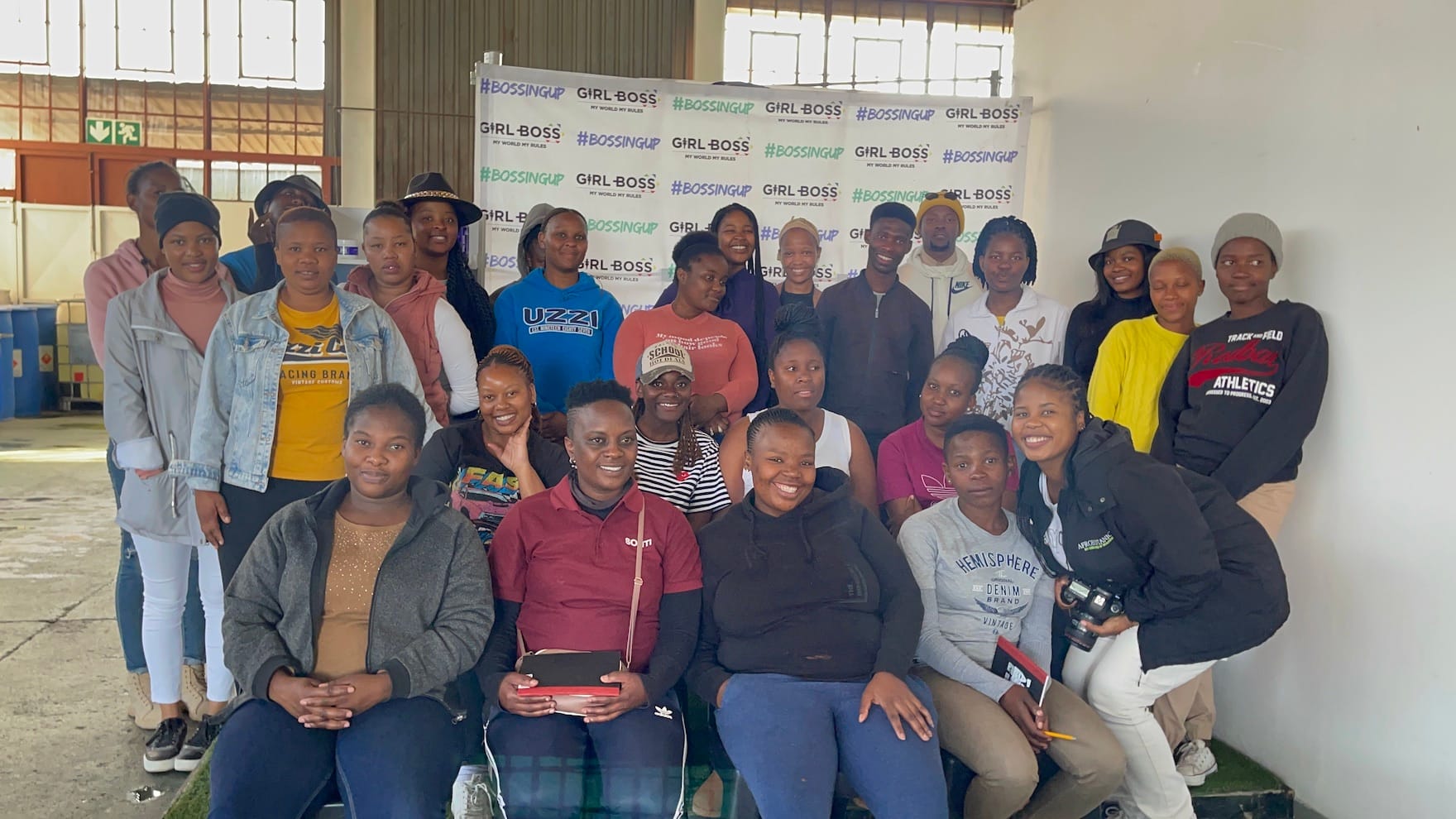 Women in community/salon setting, empowerment theme